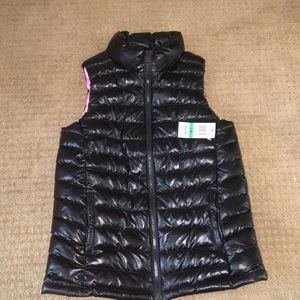 New with tags black vest with pink accents!!